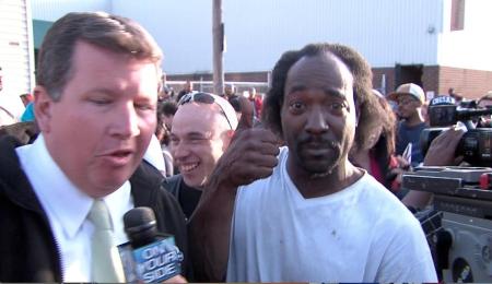 John Kosich wraps up interview with Charles Ramsey as he gives the thumbs up on his way to internet stardom.